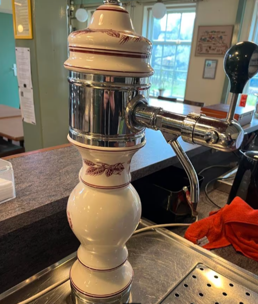 Een porseleinen biertap